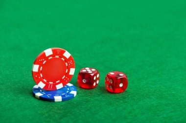 Live roulette wheel with dealer and multiple player seats visible in studio